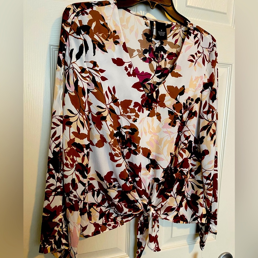 Brand new open sleeve- tie front blouse.